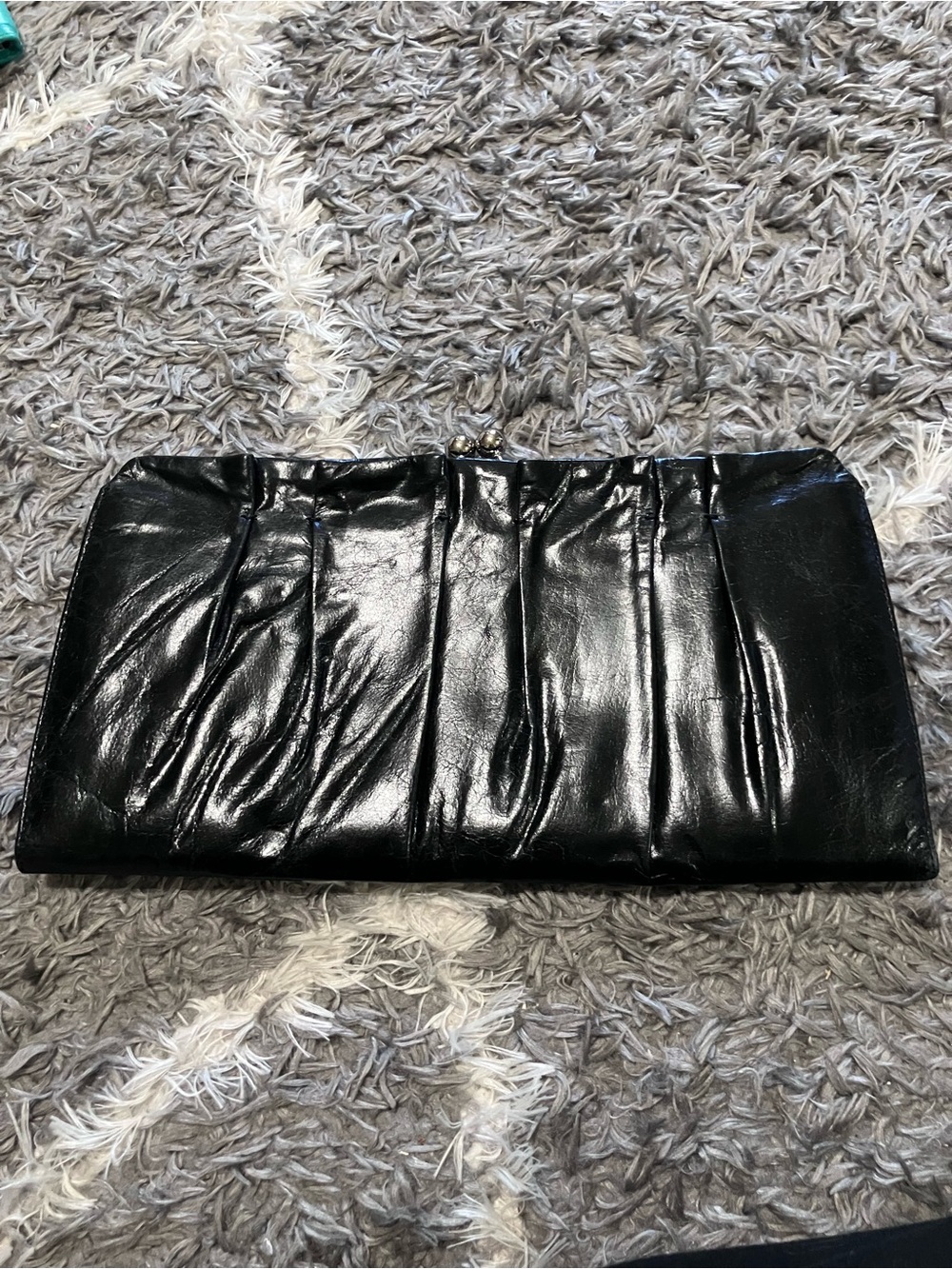 Sleek Black Leather Pleated Clutch
